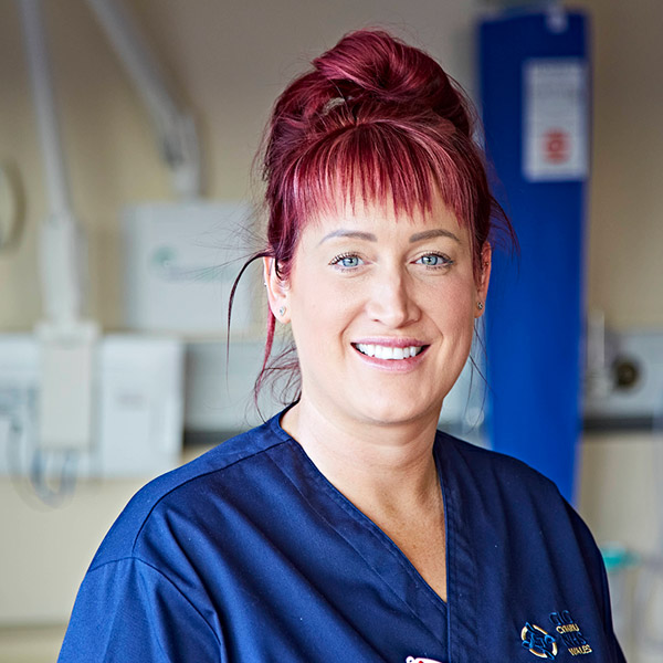 Woman nurse smiling at camera